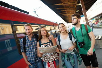 Group of friends traveling by train