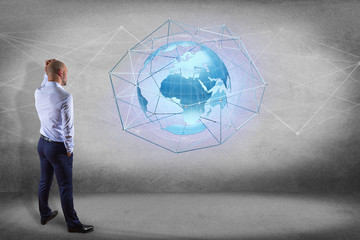 Businessman in front of a wall with a Connected network over a earth globe concept on a futuristic interface - 3d rendering