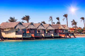 Row of bungalows near the water