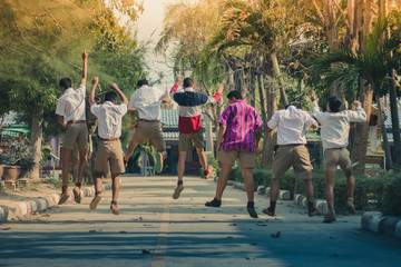 Obraz premium Group of Friends Having Fun on street in primary school.