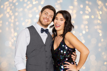 happy couple hugging at party