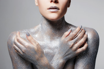 Silver Girl. Beautiful Woman in Sparkles