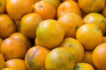 Healthy fruits, orange fruits background many orange fruits - orange fruit background