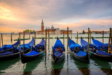 Fototapeta premium Sunrise landscape view of gondola and building in early morning with no people no tourist as beautiful amazing view and attraction in venice , Italy
