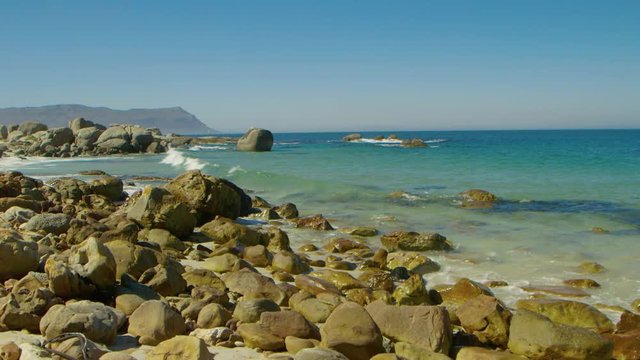 Rocky beach with translucent sea - Simonstown