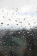 Drops of rain on the window, rainy day