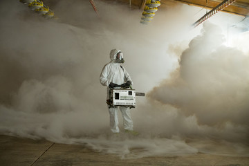 Farmer spraying pesticide