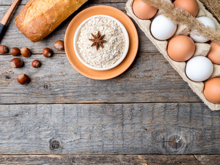Ingredients for Breakfast Oatmeal Eggs Bread Apple Rustic Wooden background Copy space