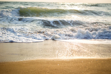 Photograp of small wave in beautiful sunlight.