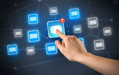 Hand touching mail icon