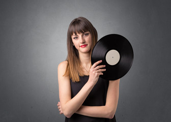 Lady holding vinyl record