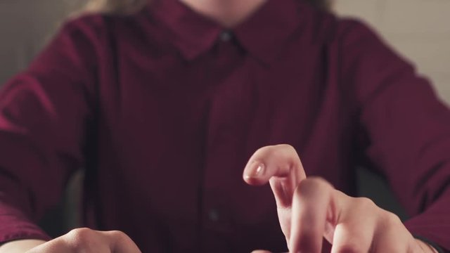female teen girl finger tapping in slow motion thinking about something or bored