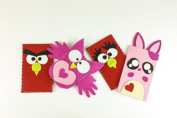 Funny felt case on white background - top view