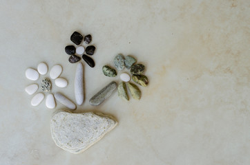 simple flowers from stone pebbles