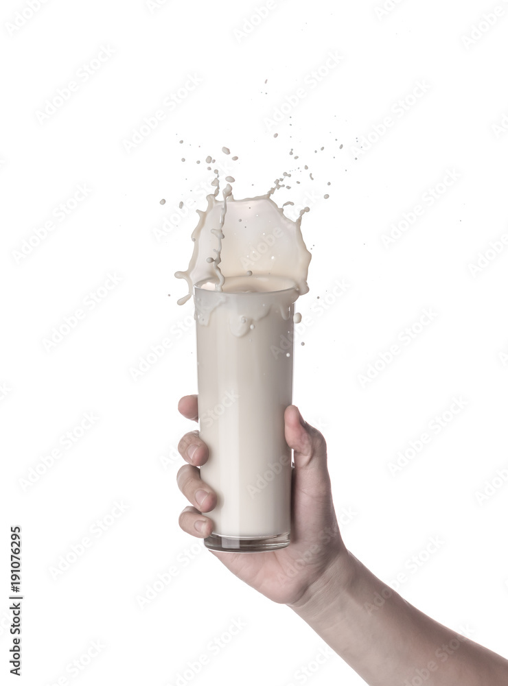 Sticker hand holding glass of milk with a splash isolated on a white background