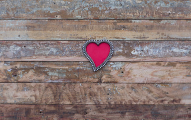 Valentine's day, heart on a wooden background