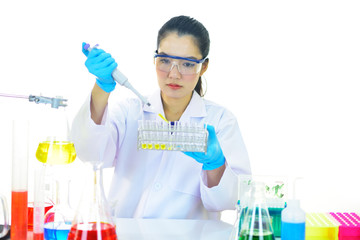 Asian female medical technologist working with chemical in research laboratory
