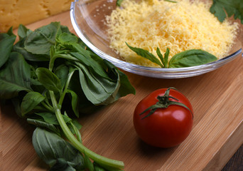 Tomato with basil, grated cheese
