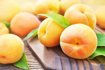 Fototapeta na wymiar Fresh ripe sweet apricots, selective focus, toned