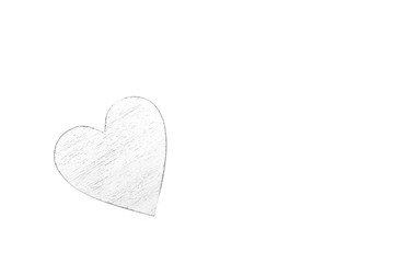 White wooden heart on black and white cardboard background.