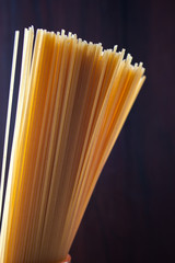 Spaghetti on a wooden background