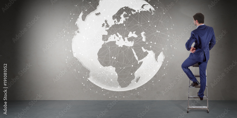 Poster Businessman using digital planet earth interface on a wall 3D rendering