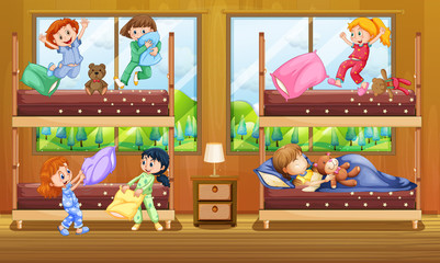 Children in bedroom with two bunkbeds