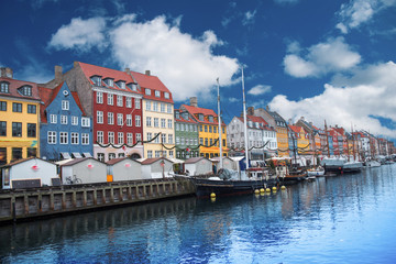 Fototapeta na wymiar Nyhavn is the old harbor of Copenhagen