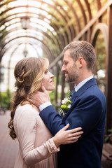 The bride and the bridegroom embrace