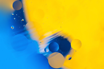 mixing water and oil, beautiful color abstract background based on circles and ovals, macro...