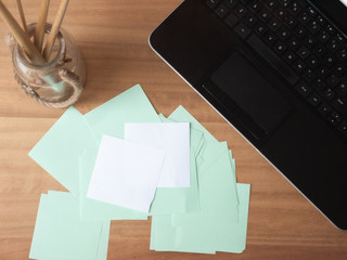 Tabletop Laptop and Note Paper