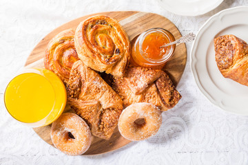 Breakfast with different French Pastries, Juice and Jam