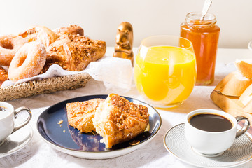 Breakfast with French Pastries, Bread, Cheese and Coffee