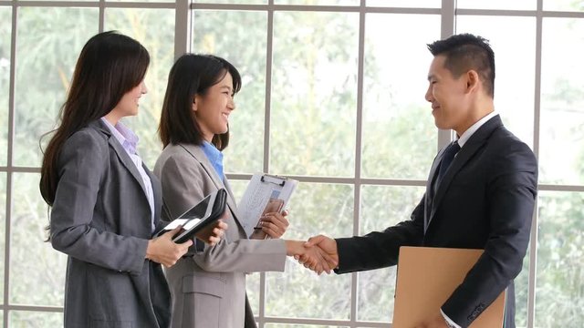 Asian people talking for business together. Business and and woman working together. People with business concept. 