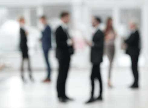 blurred image of business team in office.business background.