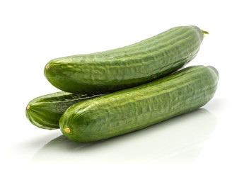 Three European cucumbers (burpless, seedless, hothouse, gourmet, greenhouse, English cucumber) isolated on white background.