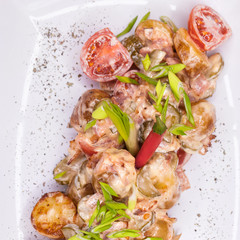 Roasted potatoes with vegetables and mushrooms