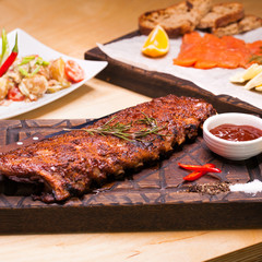 Closeup of pork ribs grilled with BBQ sauce