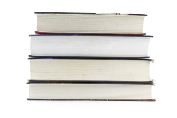 A stack of books lying on a white background