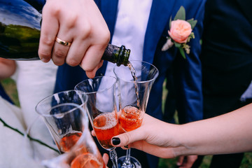 groom wine bottle goblet holiday friends