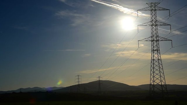 Power towers in Sardinia at sunset