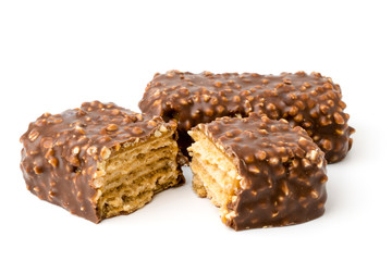 Chocolate candy with nuts close up.