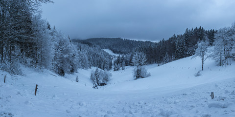 Fototapeta na wymiar Germany, Snowy winter landscape of black forest valley extra large panorama
