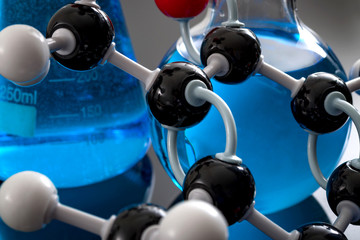 Chemical experiment and molecular science concept with a closeup on a model of a molecule with...