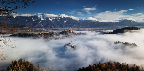 Fototapeta na wymiar amazing view over lake Bled on a foggy morning from Ojstrica viewpoint, Slovenia, Europe - travel background
