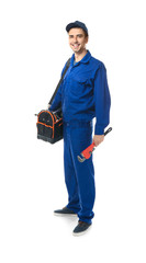 Young plumber in uniform with tool bag and pipe wrench on white background