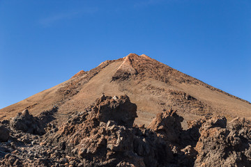 Teide National Park, Tenerife, Canary Islands - A picturesque view of the colourful Teide volcano, or in spanish 'Pico del Teide'. The tallest peak in Spain with an elevation of 3718 m