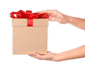Woman holding beautiful gift box on white background
