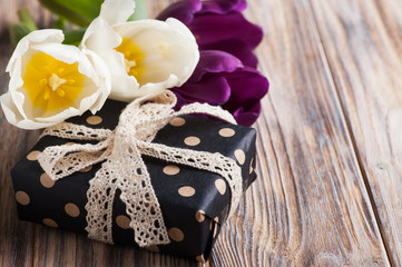 White tulip flowers and craft gifts