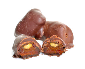 Homemade Candies with dried apricot and nuts. Isolated on white background